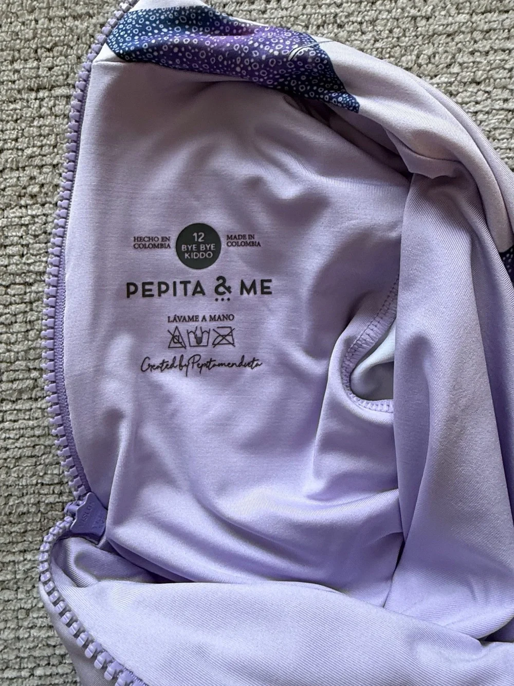 Pepita & me.   Kids Long Sleeve Swim One-Piece in Light Purple with Ray Print